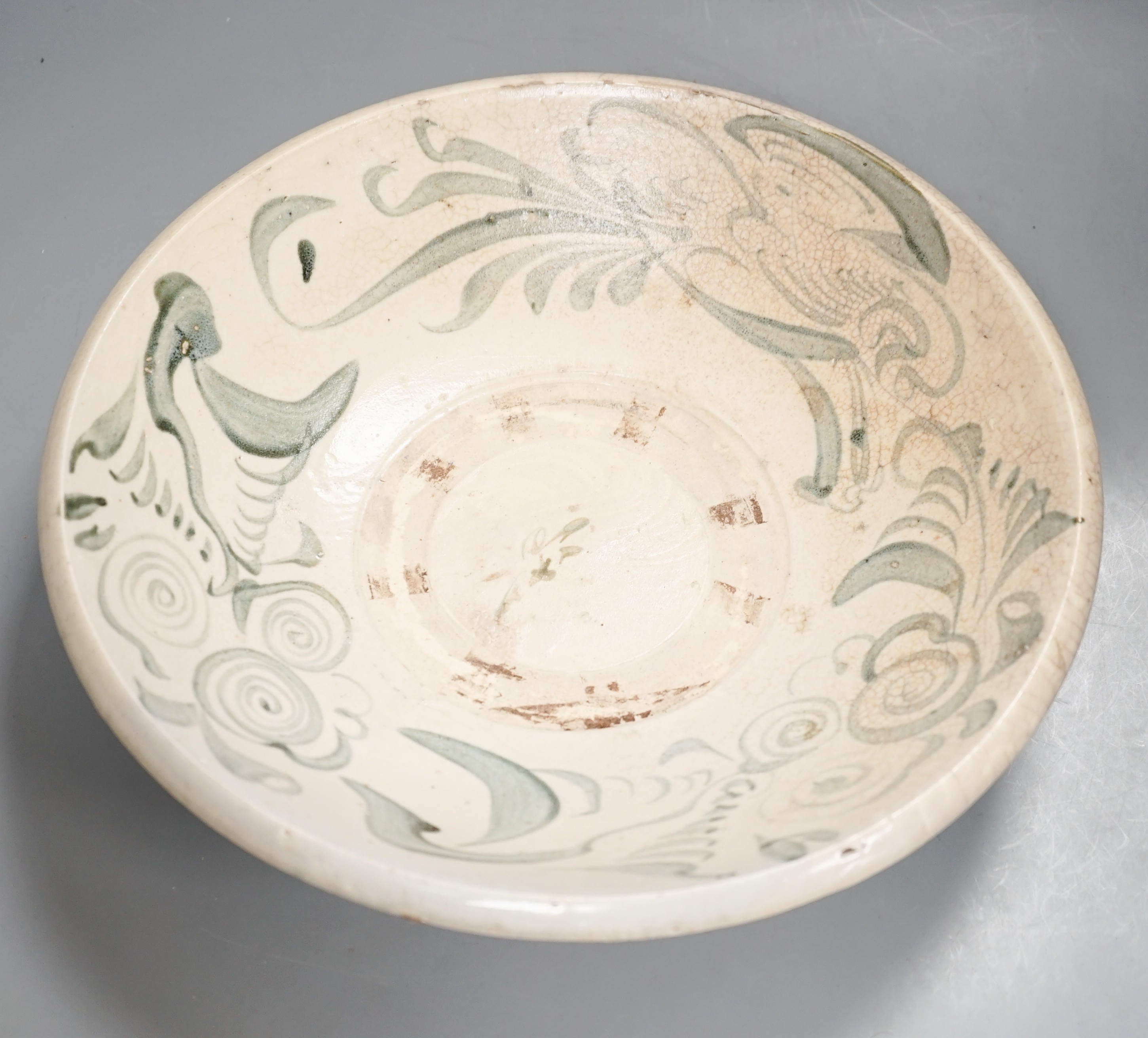 A Chinese provincial blue and white ‘kitchen Qing’ dish 32.5cm diameter